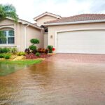 White Garage Door and Driveway Located in Jacksonville, FL