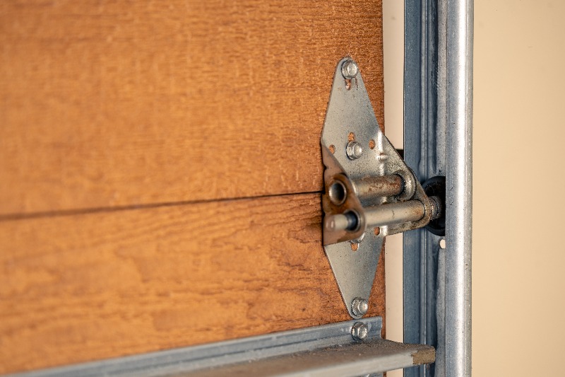 Featured image for “Understanding Garage Door Hinge Types and Their Importance”