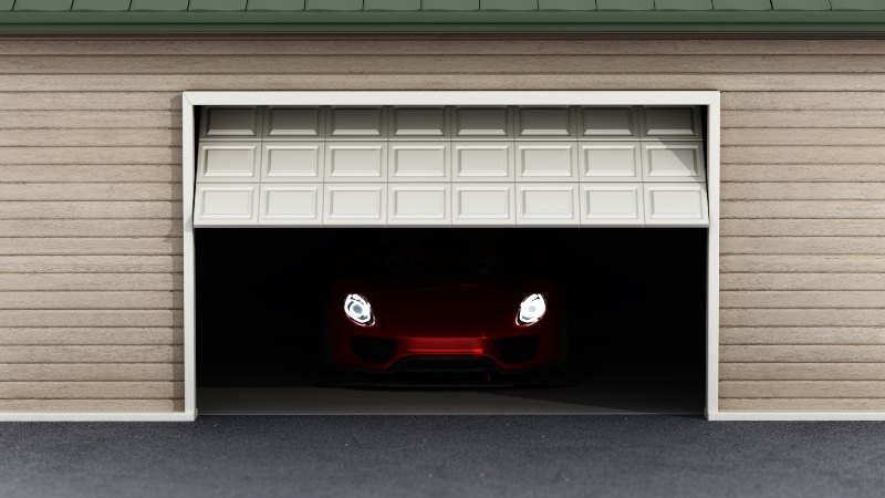 Garage door opening with car visible inside residential garage in Jacksonville, FL