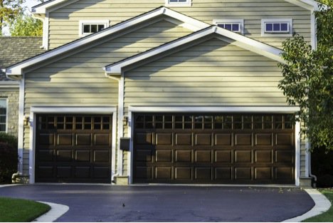 house with big brown garage doors Garage door