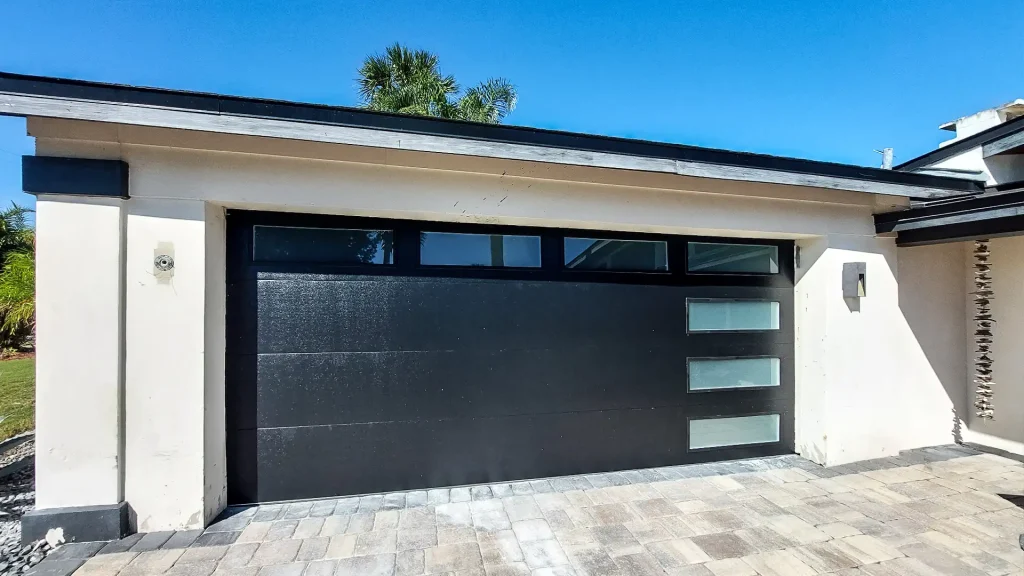 black flush-panel steel garage door